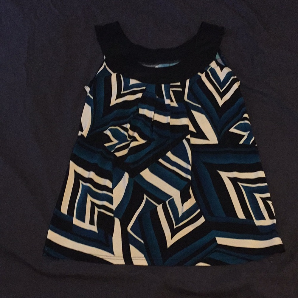 No tag , don’t know what brand. Cute top